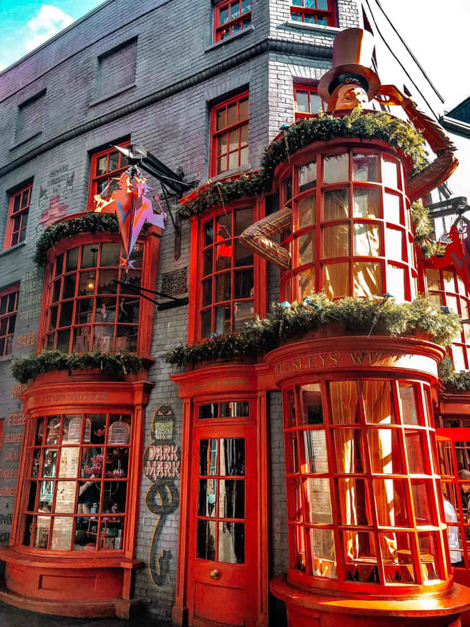 Magical Diagon Alley Bustling With Witches And Wizards Wallpaper