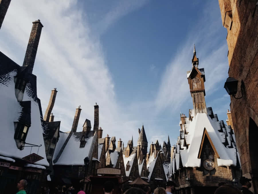 Magical Hogsmeade Village In Snow Wallpaper
