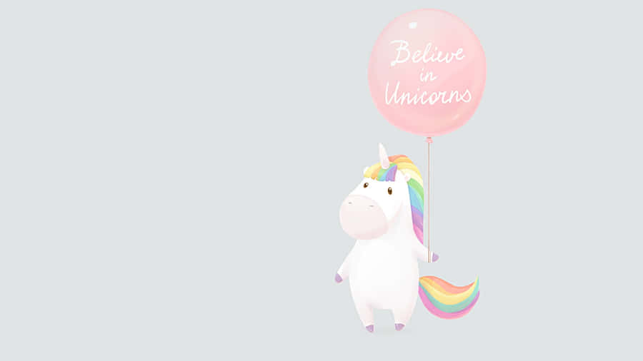 Magical Pastel Unicorn Against A Bright Blue Sky Wallpaper