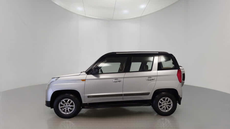Mahindra T U V300 Silver Profile View Wallpaper