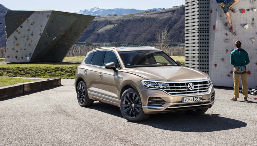 Majestic 2020 Volkswagen Touareg Cruising On Open Road Wallpaper
