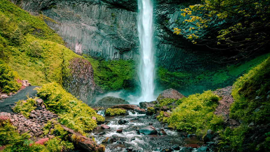 Majestic 4k Waterfall In Natural Splendor Wallpaper