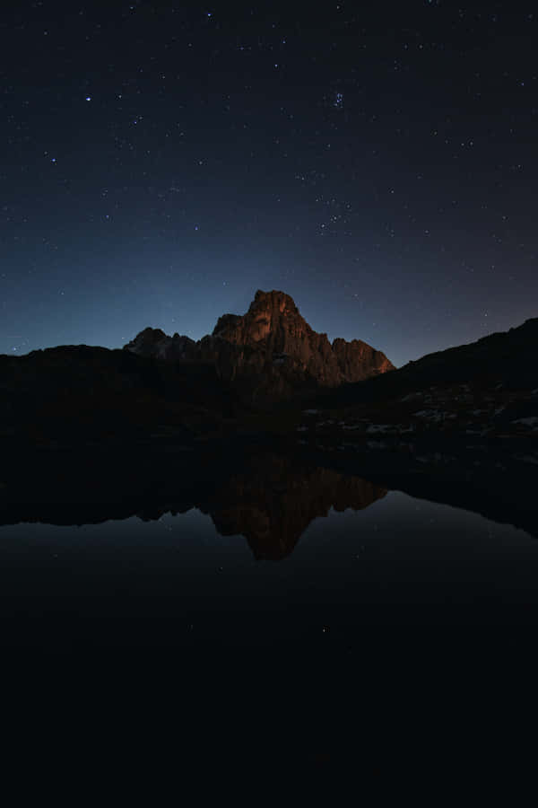 Majestic Dark Mountain At Night Wallpaper