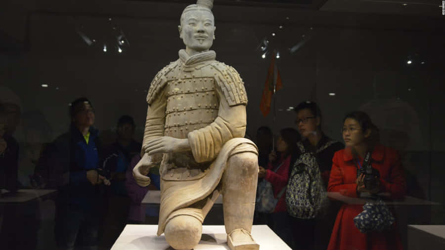 Majestic Display Of Terracotta Warriors In Museum Wallpaper