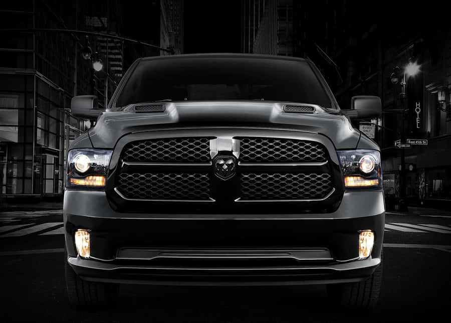 Majestic Dodge Ram Dominating The Off-road Terrain Wallpaper