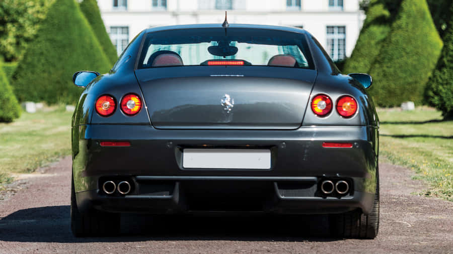 Majestic Ferrari 612 Scaglietti On The Move Wallpaper
