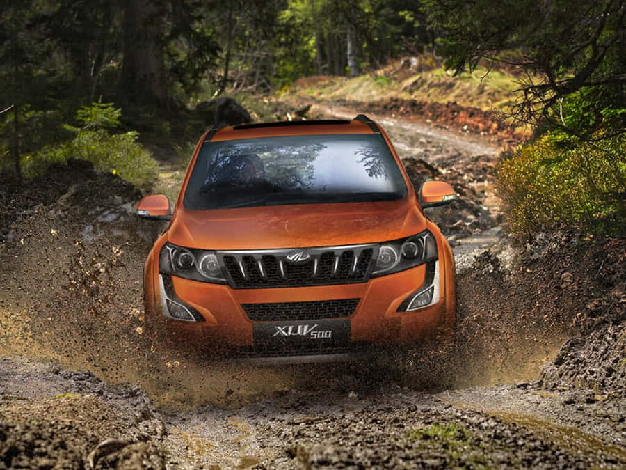 Majestic Mahindra Xuv500 On The Road Wallpaper