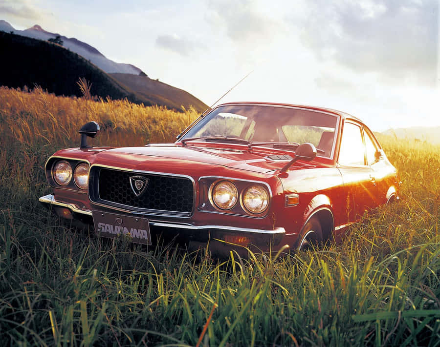Majestic Mazda Rx-3 In Action Wallpaper