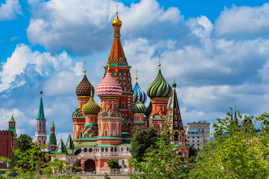 Majestic Saint Basil's Cathedral Nestled Amidst Lush Greenery. Wallpaper