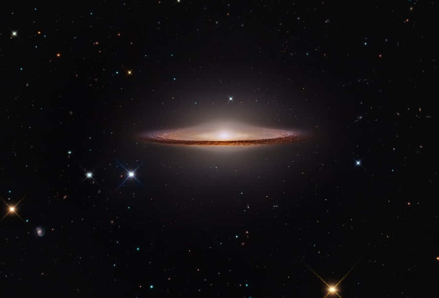 Majestic Sombrero Galaxy In The Night Sky Wallpaper