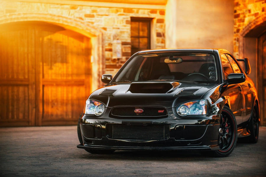 Majestic Subaru In Pitch Black Paint Wallpaper