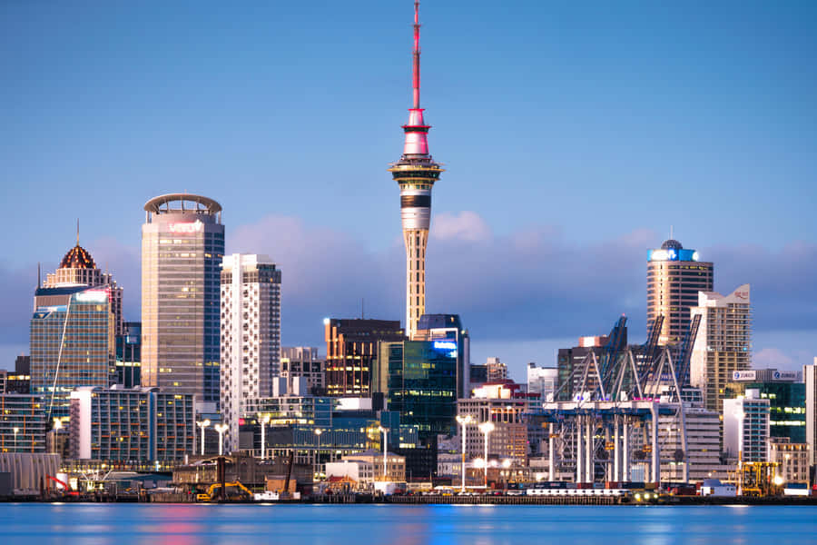 Majestic Sundown Over Auckland Sky Tower Wallpaper