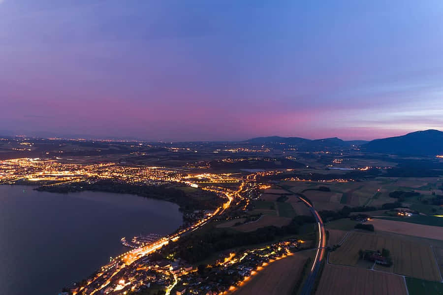 Majestic Sunset Over Yverdon Les Bains Wallpaper