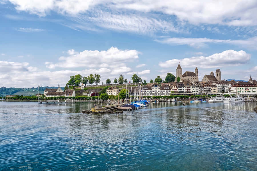 Majestic Sunset View Of Rapperswil Castle Overlooking Lake Zurich, Rapperswil Jona, Switzerland Wallpaper