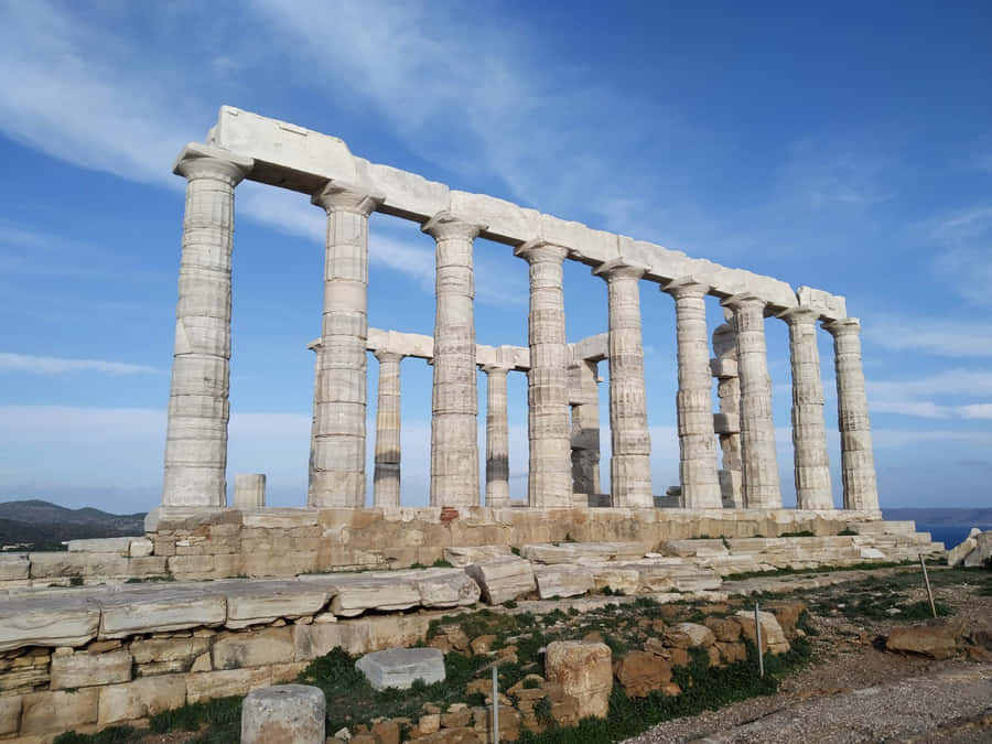 Majestic View Of The Ancient Temple Of Poseidon Wallpaper