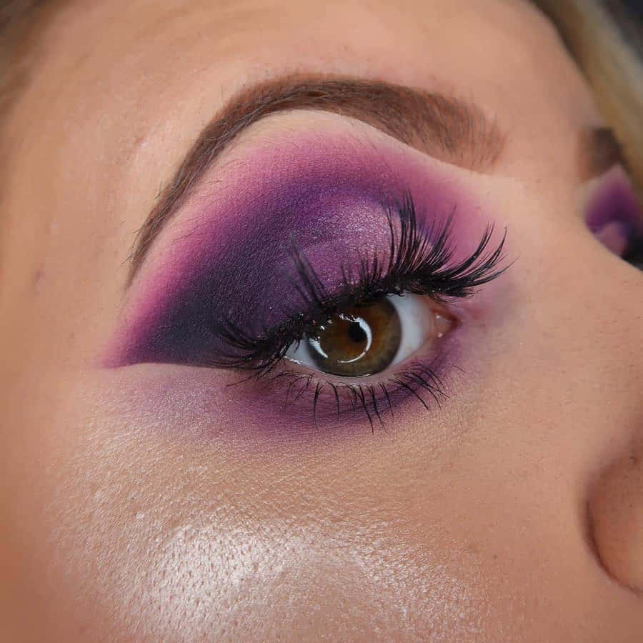 Make A Bold Statement With Purple Eye Shadow. Wallpaper