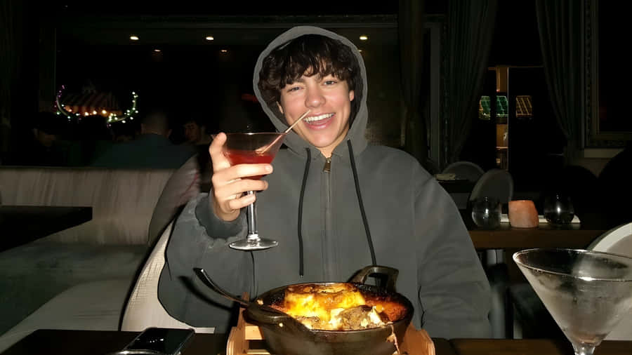 Malachi Barton Enjoying Dinner Wallpaper