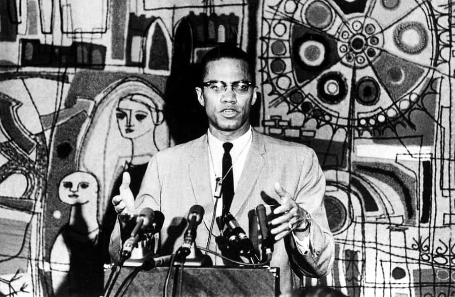 Malcolm X Speakingat Podium Wallpaper