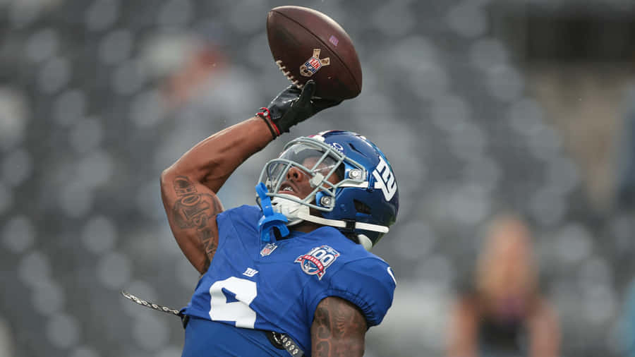 Malik Nabers Catching Football Wallpaper