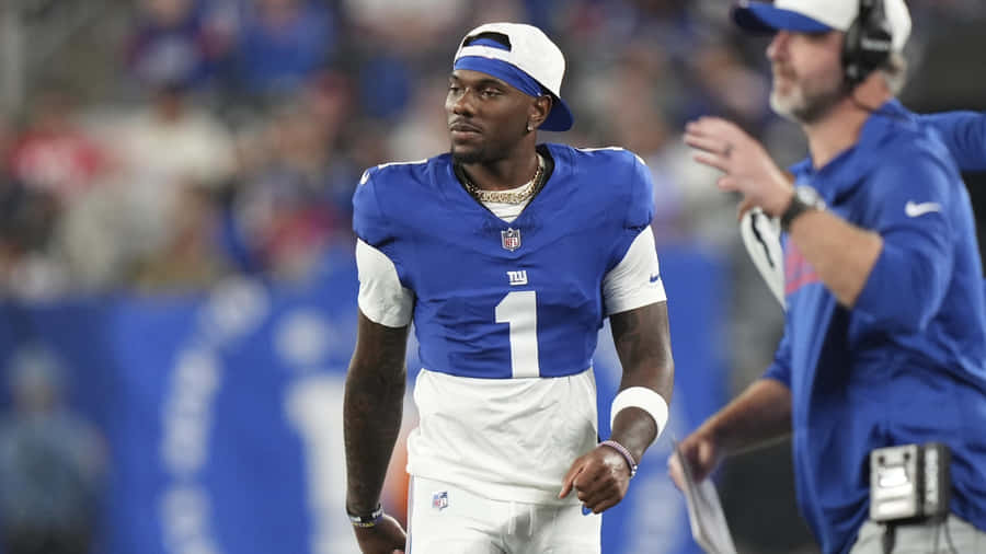 Malik Nabers On Field Wallpaper