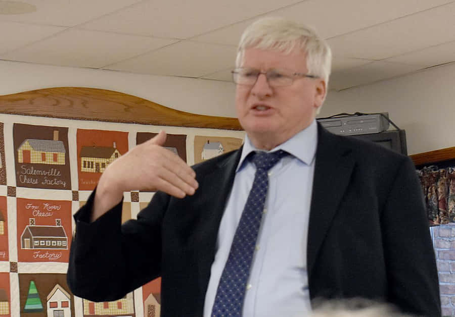 Man Giving Speechat Event.jpg Wallpaper