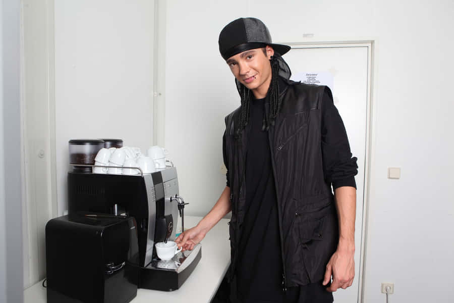 Man Making Coffee Backstage Wallpaper
