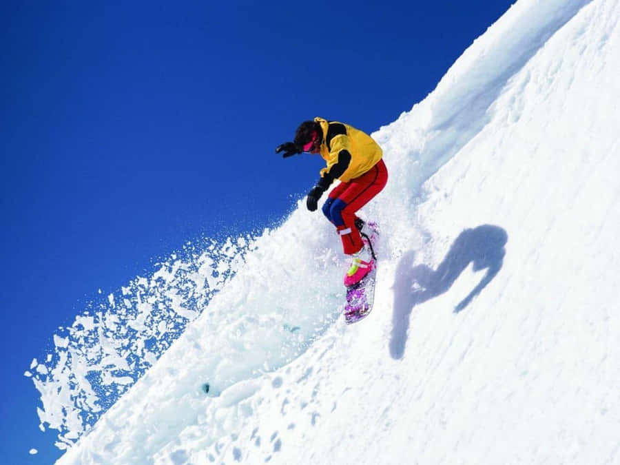 Man Skiing In Steep Mountain Wallpaper