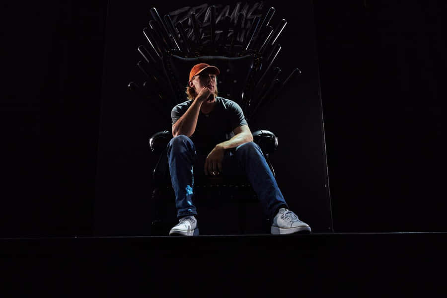 Man Throne Contemplation Wallpaper