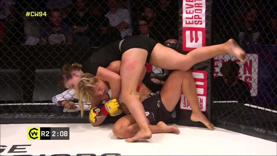 Manon Fiorot In Action During A Ufc Fight Wallpaper