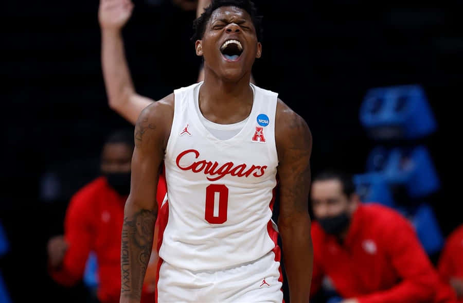 Marcus Sasser In Action During A Basketball Game Wallpaper