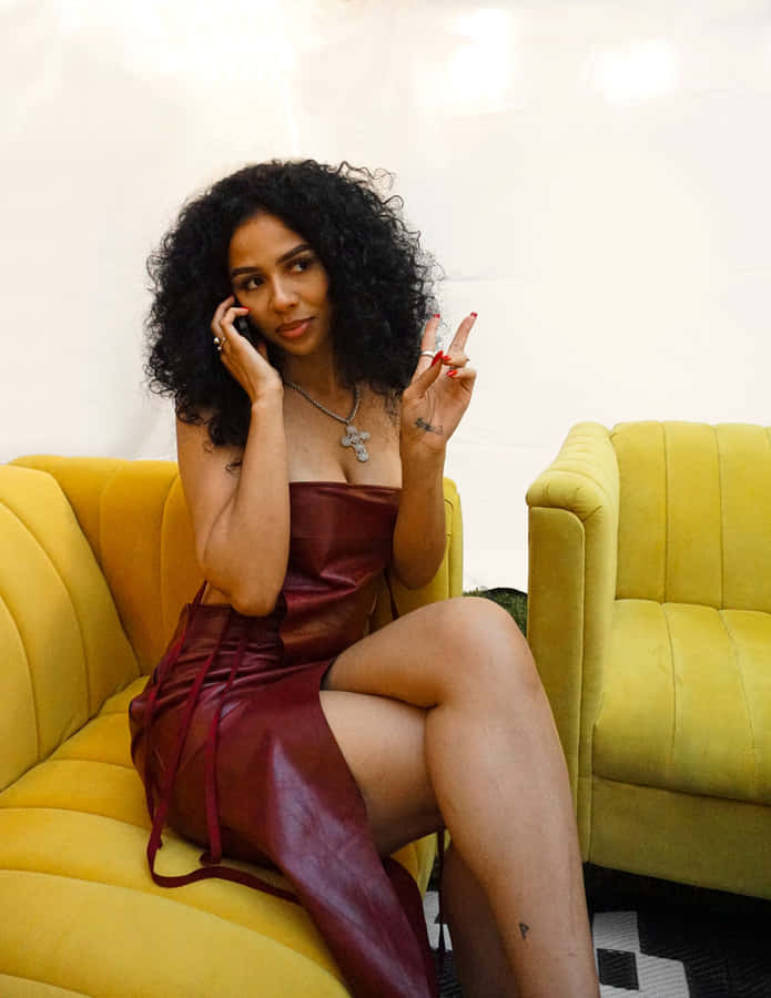 Mariah The Scientist Yellow Couch Phone Call Wallpaper