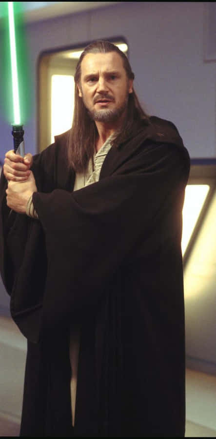 Master Qui-gon Jinn In A Moment Of Reflection Wallpaper