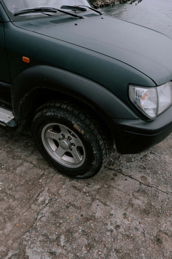 Matte Black S U V Closeup Wallpaper