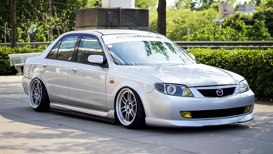 Mazda Protege On The Road Wallpaper