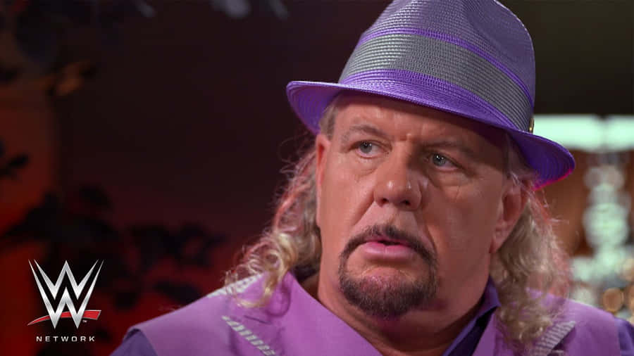 Michael Hayes Wearing Purple Fedora Wallpaper