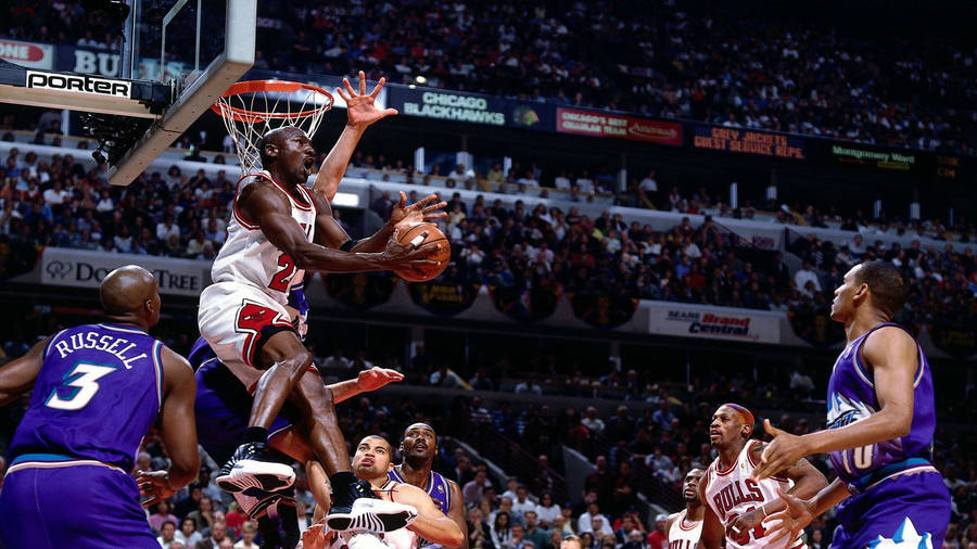 Michael Jordan Performing His Best Nba Move Wallpaper
