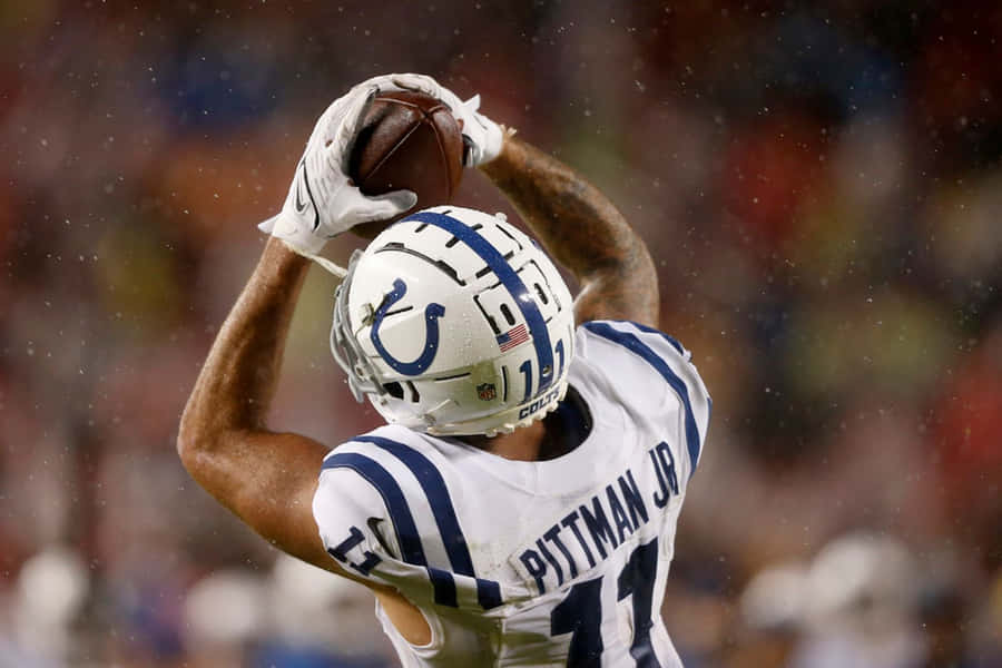 Michael Pittman Jr Catching Football Wallpaper