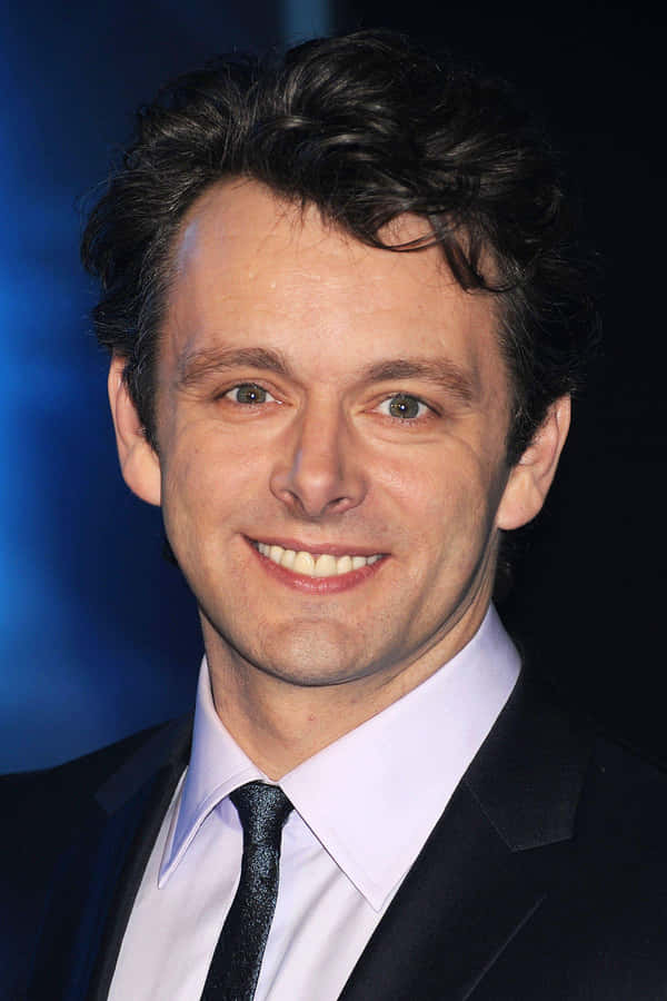 Michael Sheen Gives A Devilish Grin Wallpaper