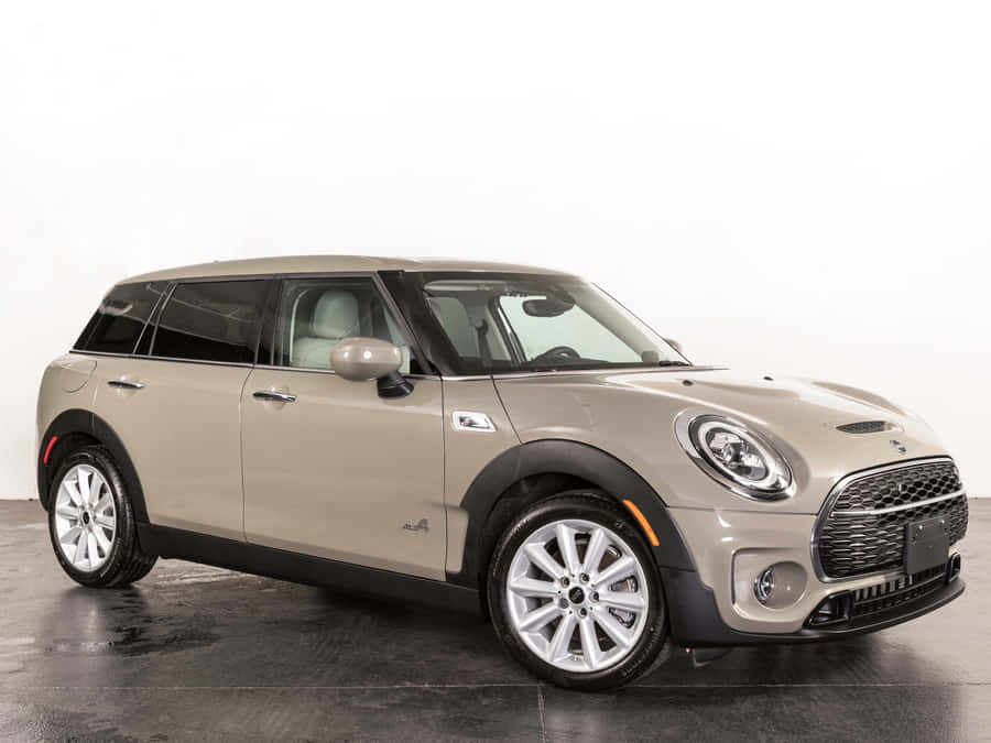 Mini Cooper S Clubman All4 In Silver On A Scenic Road Wallpaper