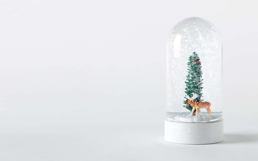 Minimalist Christmas Snow Globe Wallpaper