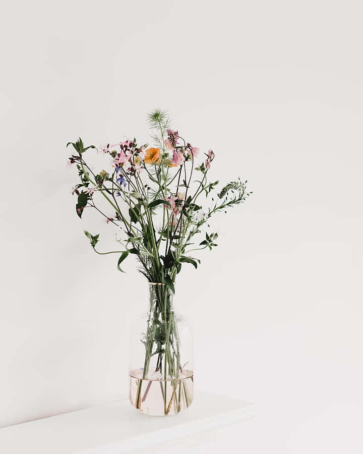 Minimalist Floral Arrangementin Vase Wallpaper