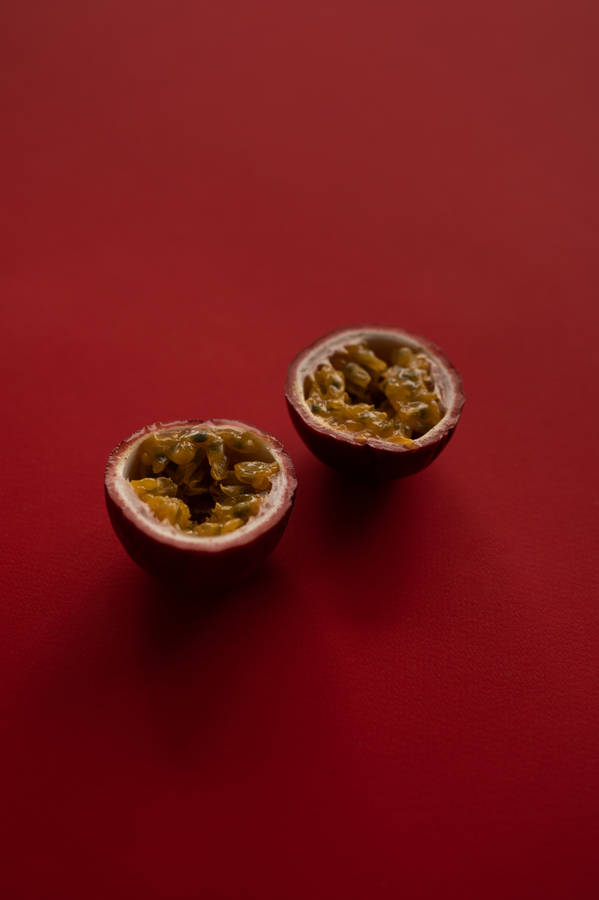 Minimalist Ripe Passion Fruit Presentation Wallpaper