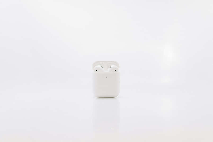 Minimalist White Wireless Earbuds Wallpaper