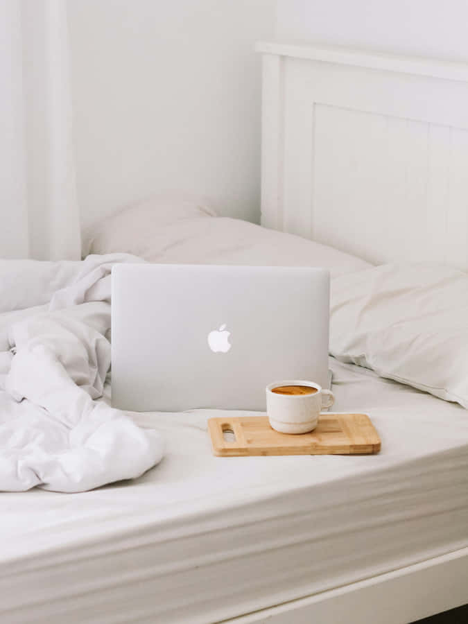 Minimalist Workfrom Bed Setup Wallpaper
