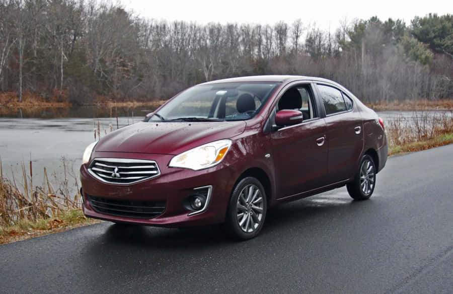 Mitsubishi Mirage Burgundy Side View Wallpaper