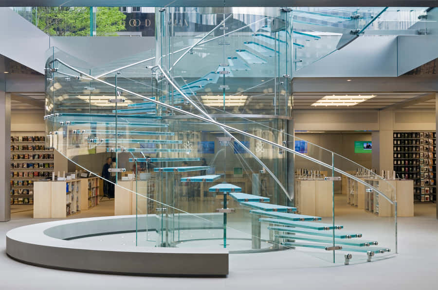 Modern Apple Store Interiorwith Glass Staircase Wallpaper