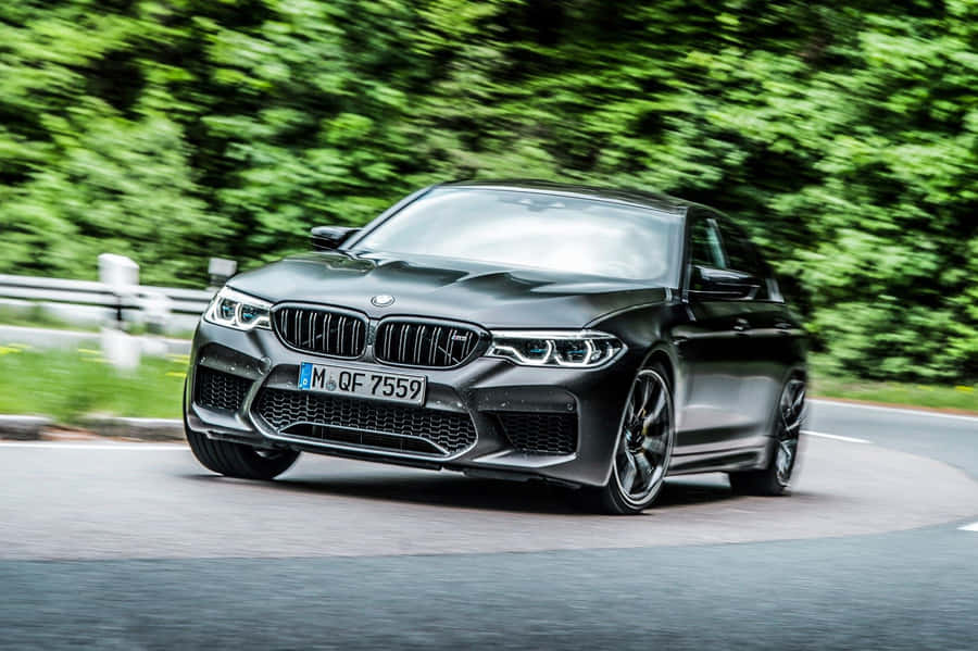 Modern Hybrid Car On A Scenic Road Wallpaper