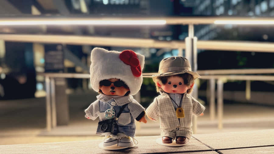 Monchhichi Dolls In Stylish Outfits Wallpaper