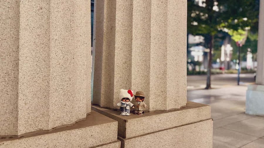 Monchhichi Dolls Urban Scene Wallpaper