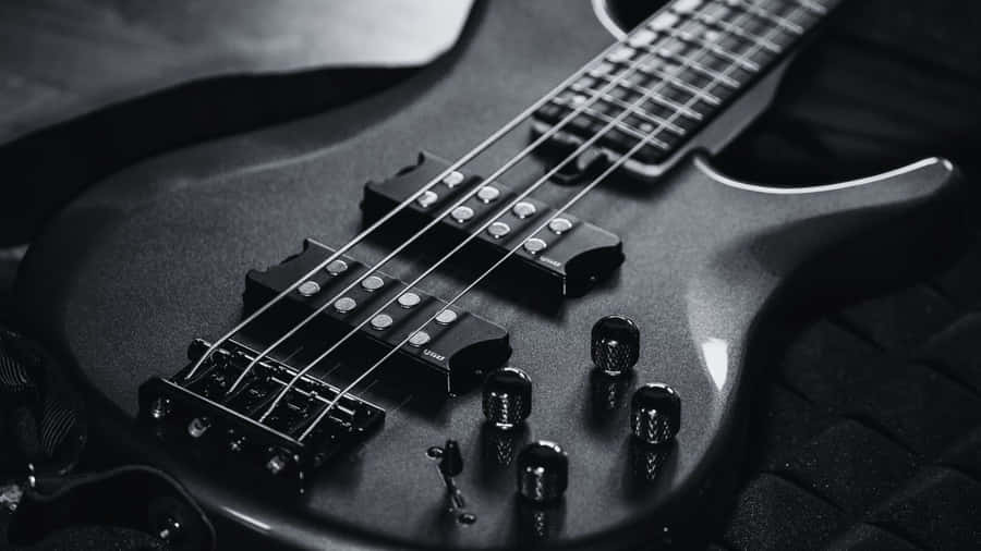 Monochrome Guitar On Display Wallpaper